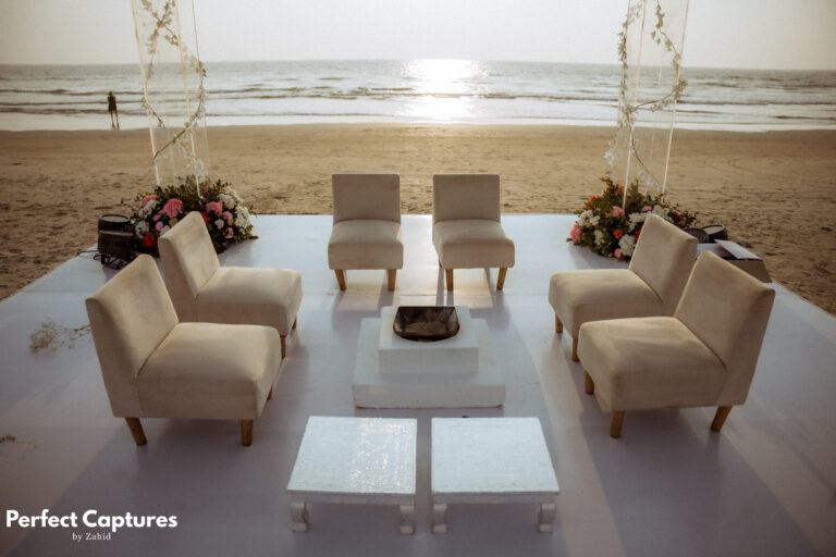 Mandap seating arrangement with traditional chairs and floral decor for an Indian wedding ceremony